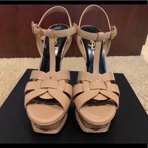 Saint Laurent “Tribute” leather sandal.